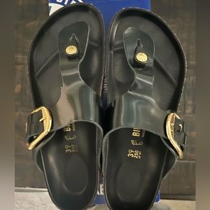 Women’s Birkenstock Gizeh Big Buckle sandals.